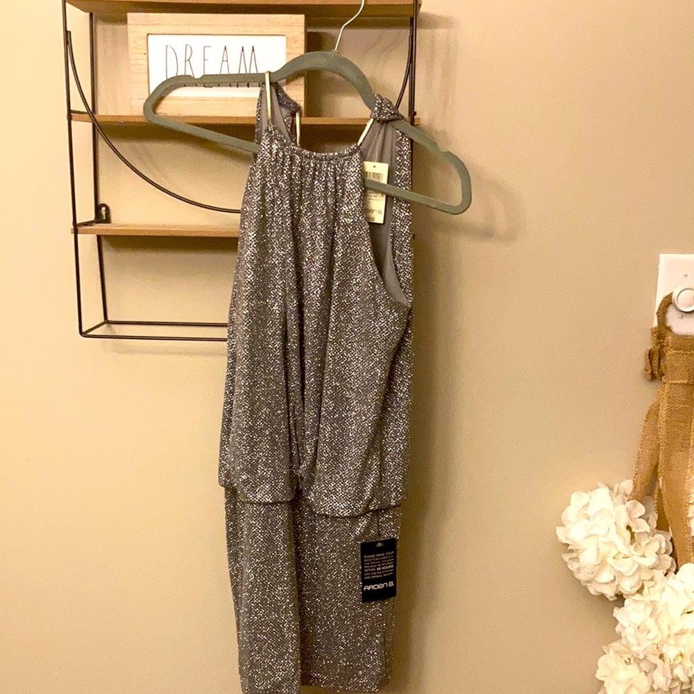 Stunning silver metallic dress from Arden B never worn nee with tags .
